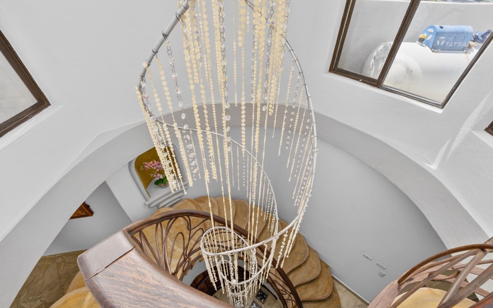 CASA PIEDRAS CHINAS — Centro, San Miguel de Allende — photo 29 — elegant spiral staircase, artisanal craftsmanship