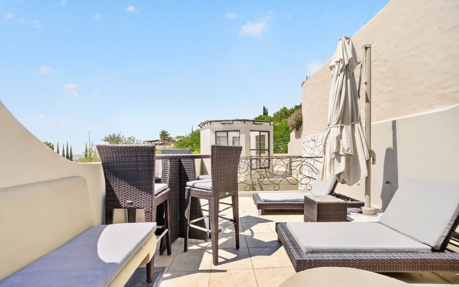 CASA PIEDRAS CHINAS — Centro, San Miguel de Allende — photo 4 — sunlit rooftop terrace, luxury outdoor living