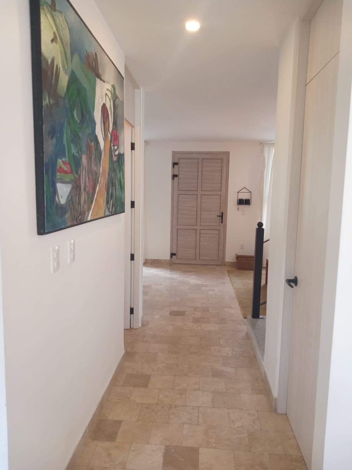 Villa Mila — La Luminaria, San Miguel de Allende — photo 8 — elegant hallway with rustic wood flooring