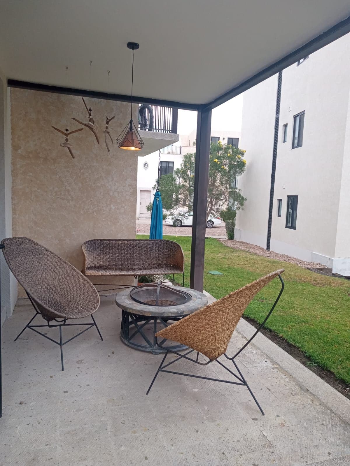 Villa Mila — La Luminaria, San Miguel de Allende — photo 9 — sophisticated covered courtyard with firepit