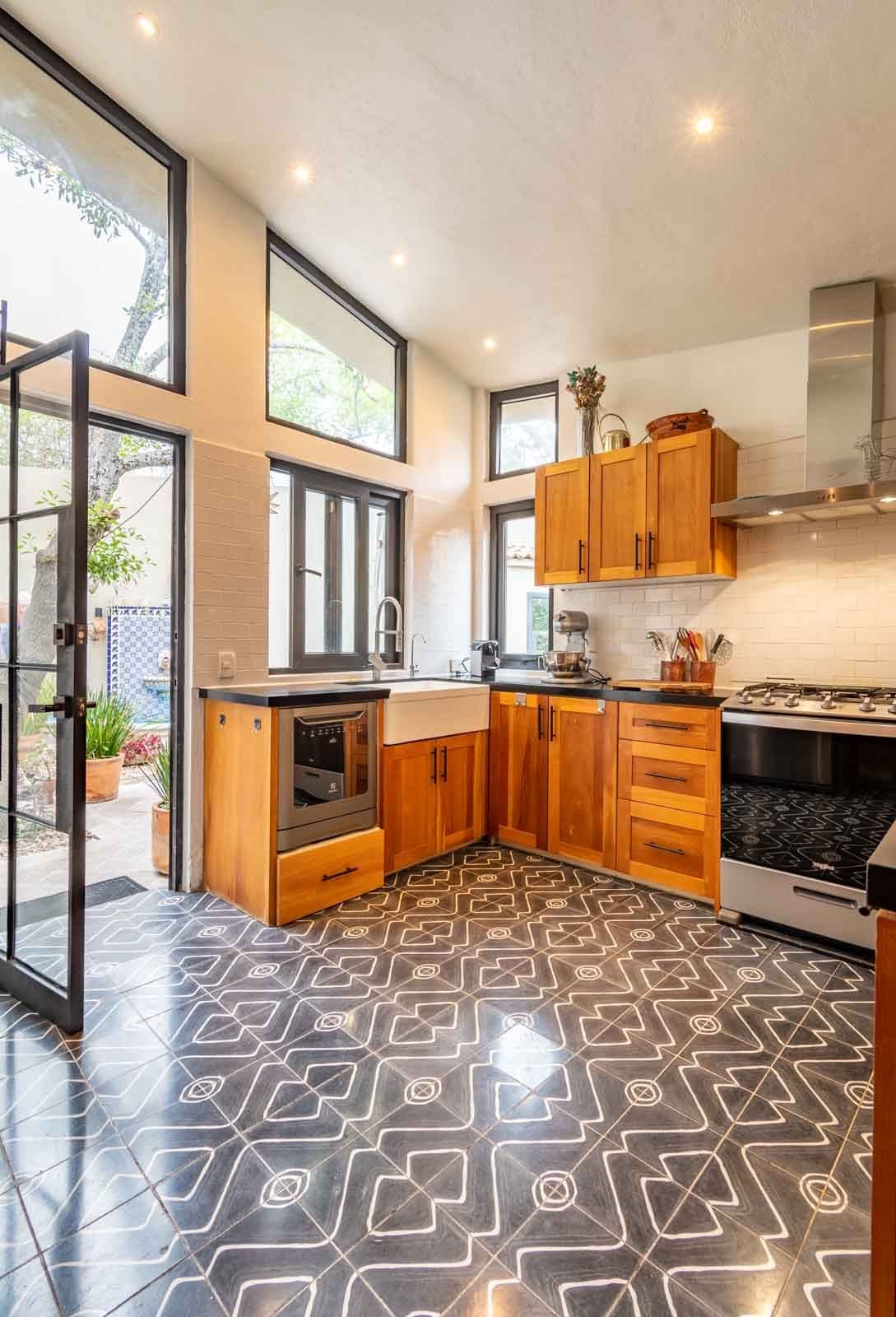 Casa Vista del Cielo — Atascadero (Arcos de San Miguel), San Miguel de Allende — photo 5 — luminous contemporary kitchen with artisanal charm