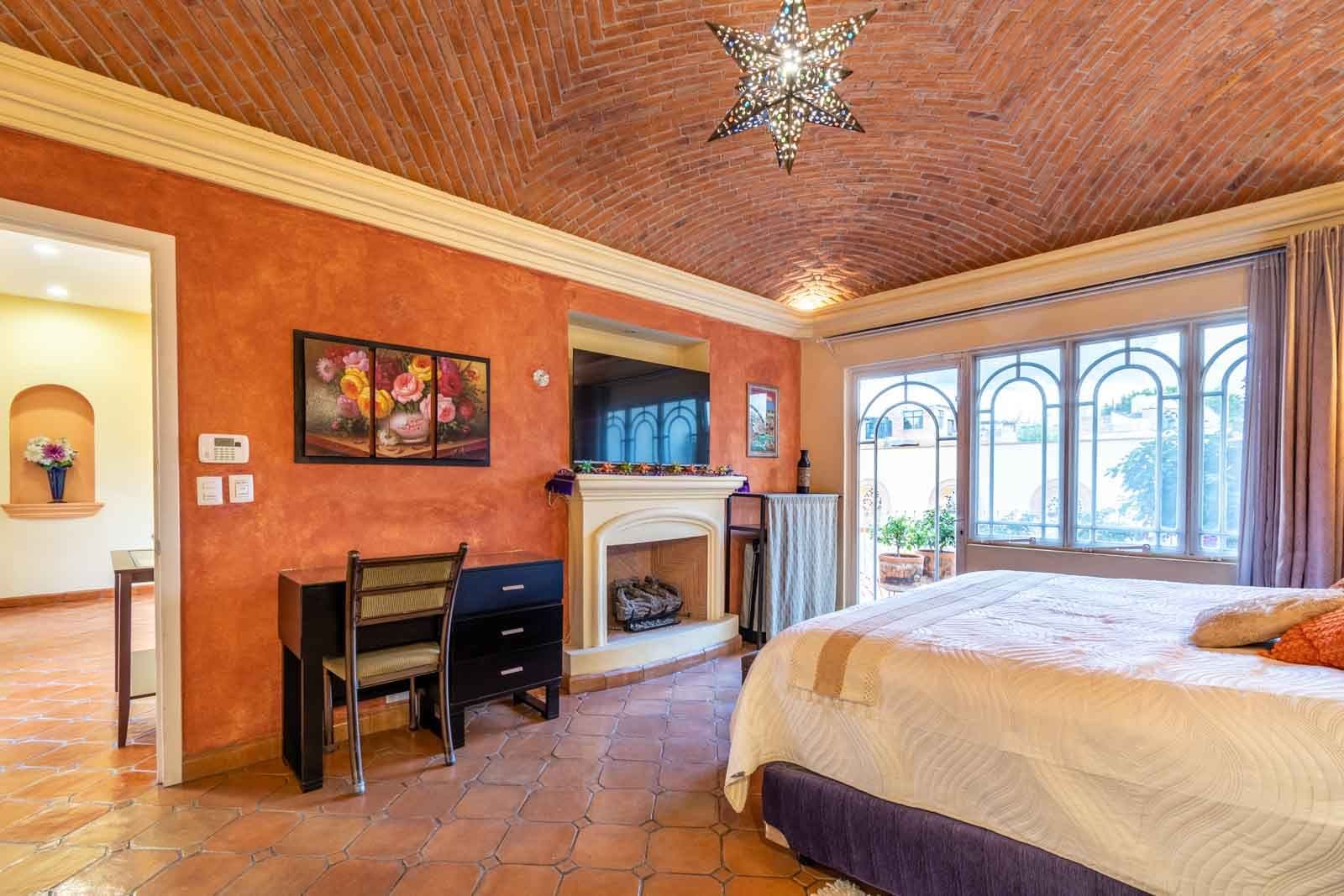 CASA ARCO de LUZ — Guadalupe, San Miguel de Allende — photo 17 — luminous colonial bedroom, terracotta elegance