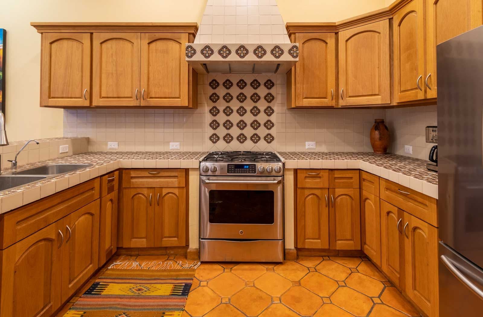 CASA ARCO de LUZ — Guadalupe, San Miguel de Allende — photo 11 — traditional mexican kitchen, warm elegance