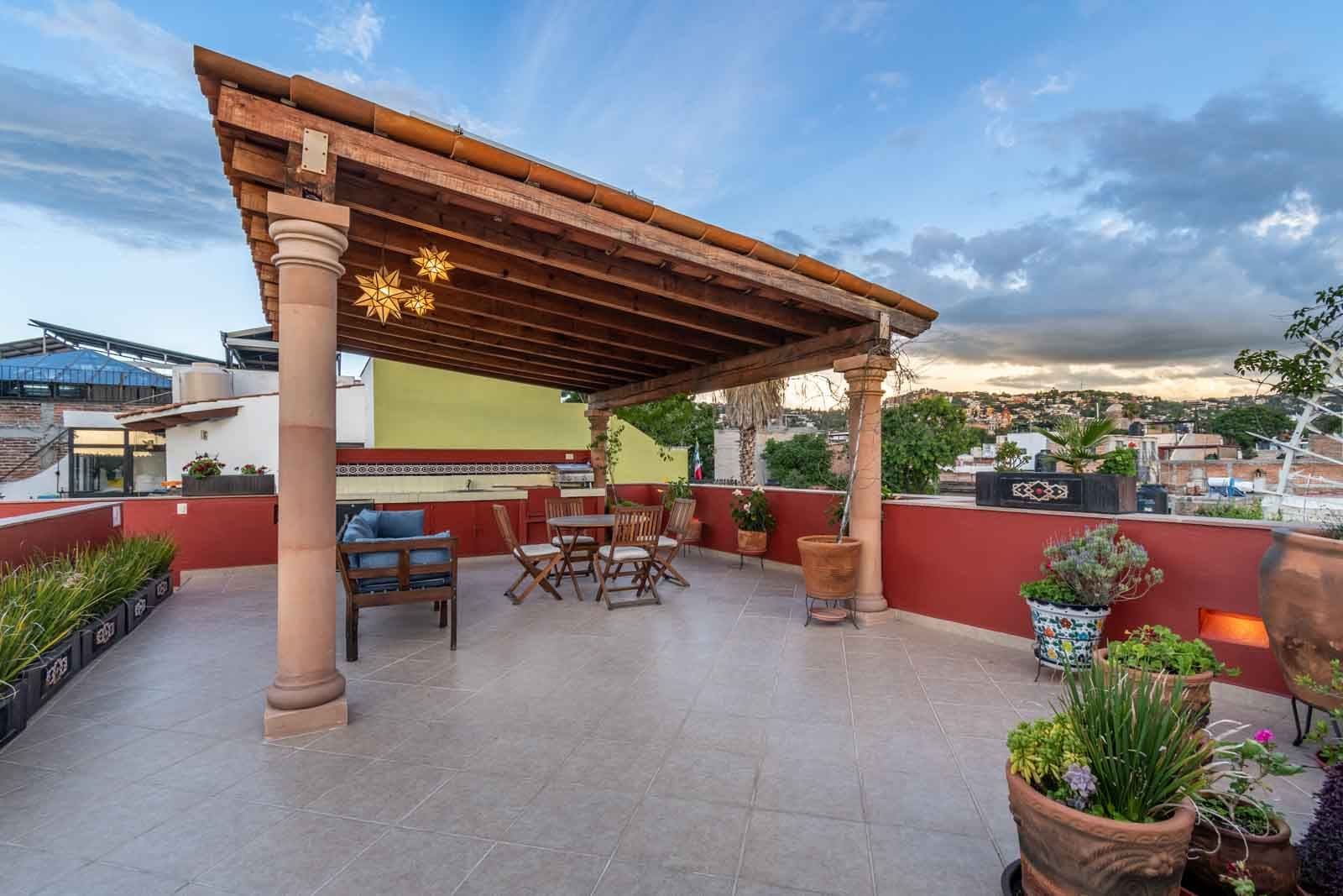 CASA ARCO de LUZ — Guadalupe, San Miguel de Allende — photo 21 — expansive rooftop terrace, commanding city views