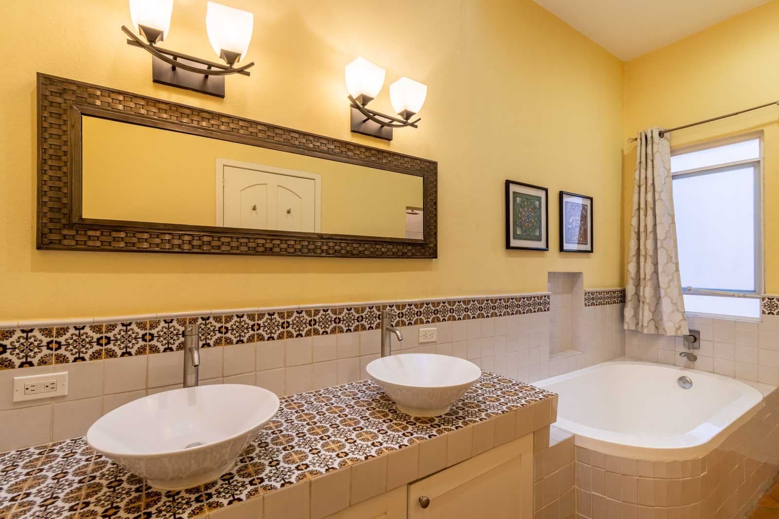 CASA ARCO de LUZ — Guadalupe, San Miguel de Allende — photo 19 — sunny spa-like master bath retreat