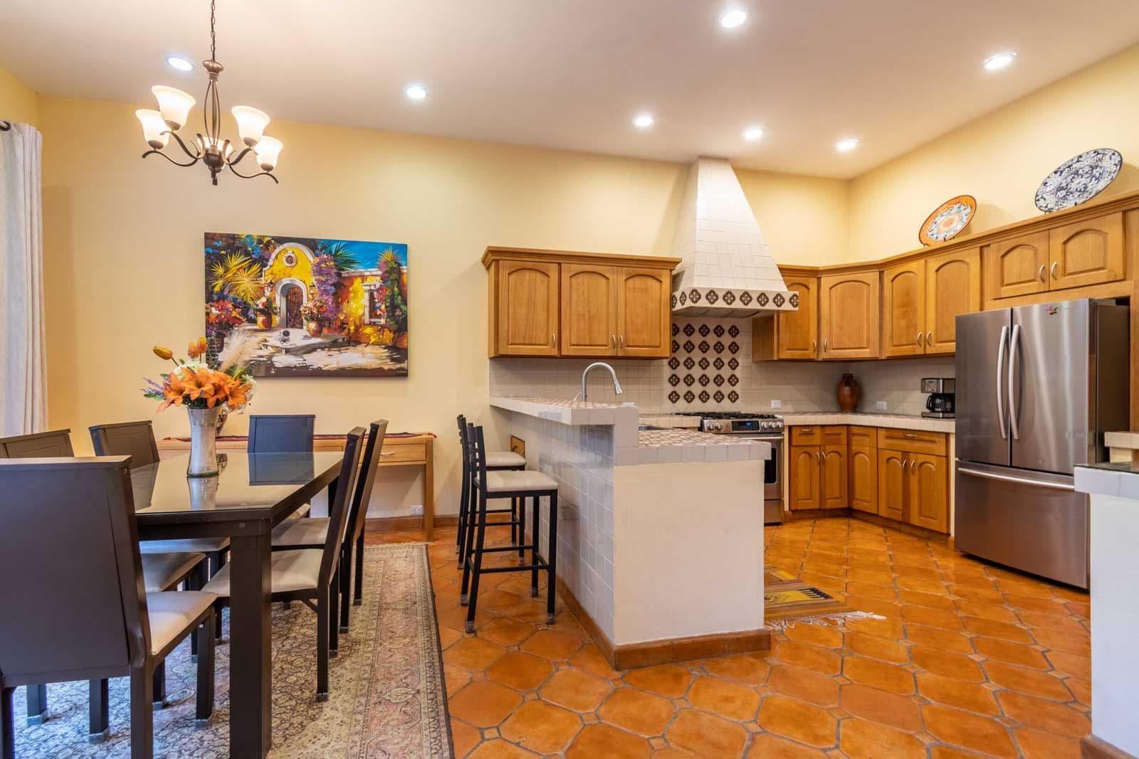 CASA ARCO de LUZ — Guadalupe, San Miguel de Allende — photo 9 — sunny traditional kitchen with terracotta charm