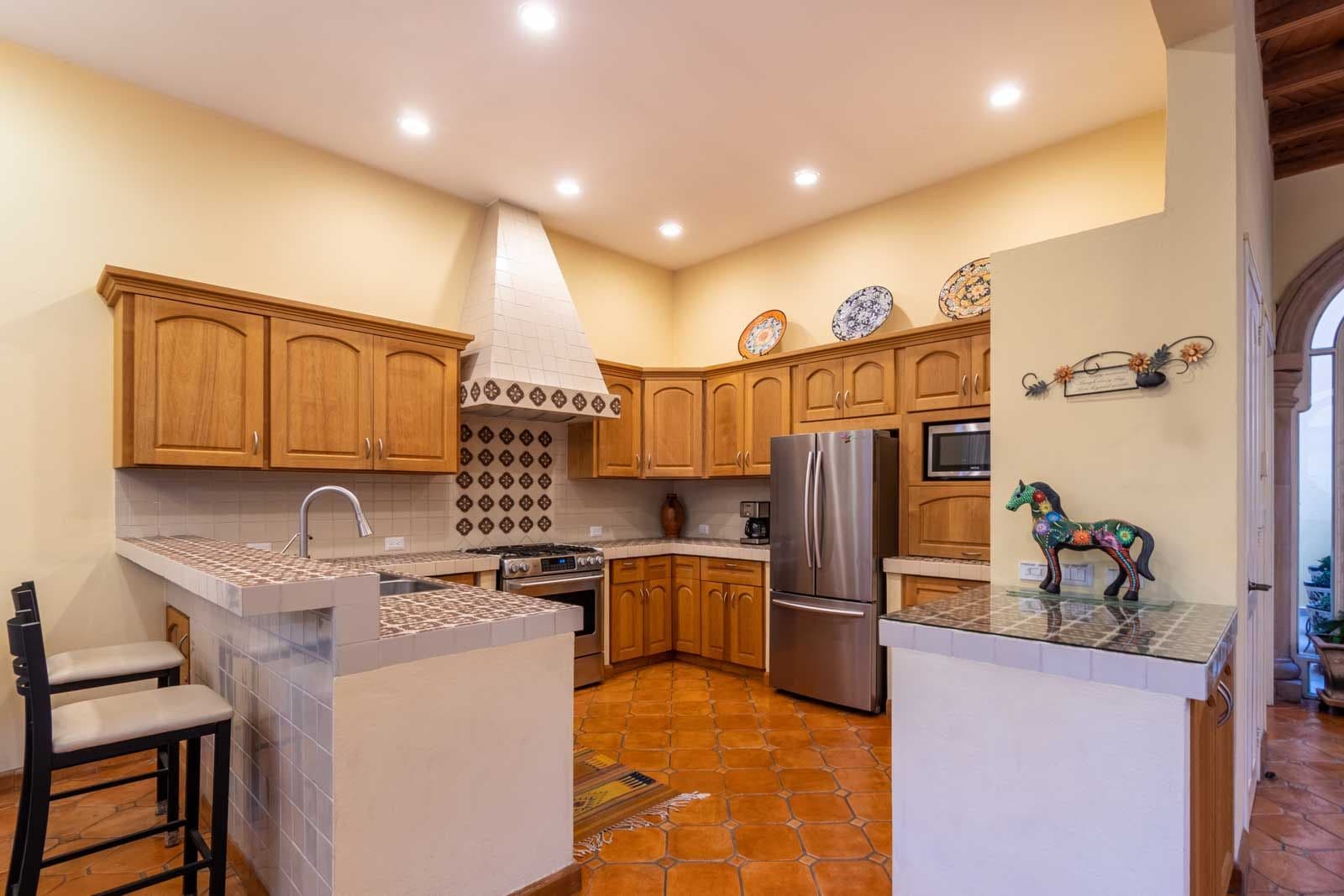 CASA ARCO de LUZ — Guadalupe, San Miguel de Allende — photo 10 — charming traditional kitchen, warm ambiance