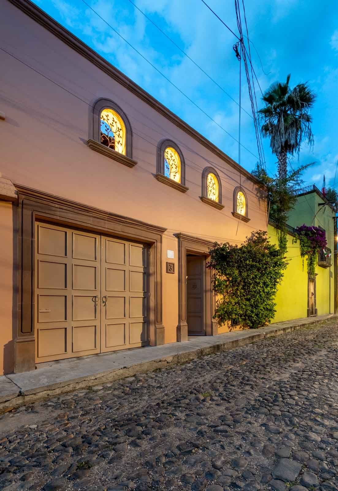 CASA ARCO de LUZ — Guadalupe, San Miguel de Allende — photo 26 — charming colonial facade, twilight elegance