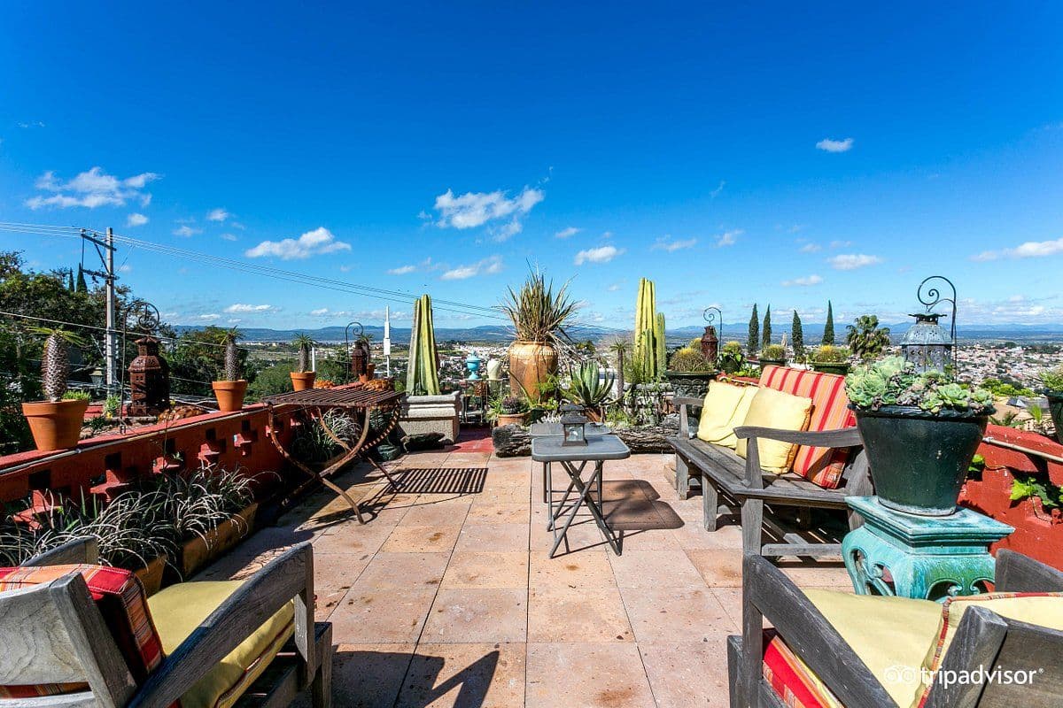 CASA CINCO PATIOS CENTRO β Centro, San Miguel de Allende β photo 19 β panoramic rooftop terrace, mountain vistas