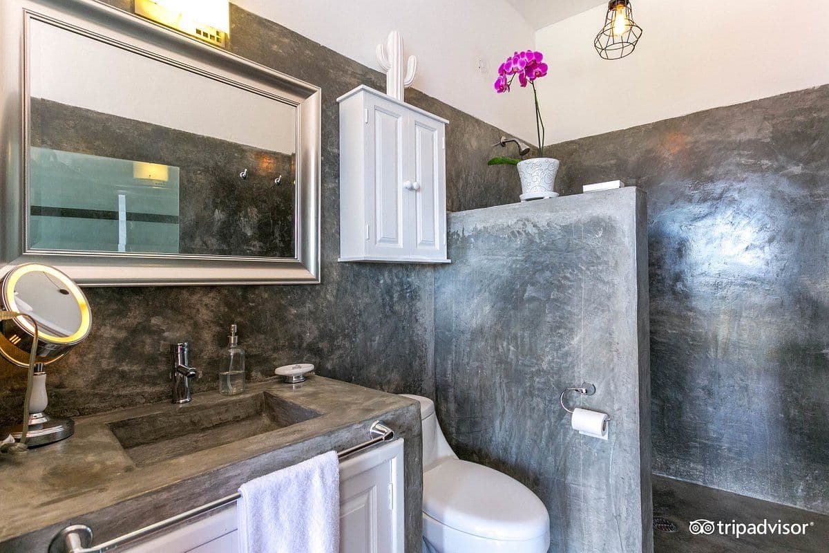 CASA CINCO PATIOS CENTRO β Centro, San Miguel de Allende β photo 11 β sophisticated concrete spa bathroom oasis