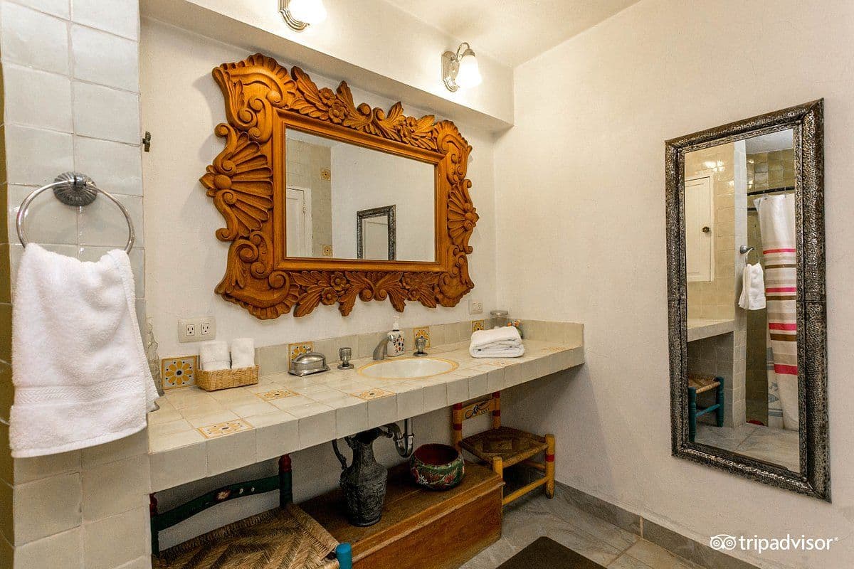 CASA CINCO PATIOS CENTRO β Centro, San Miguel de Allende β photo 13 β artisan-crafted bathroom with ornate details