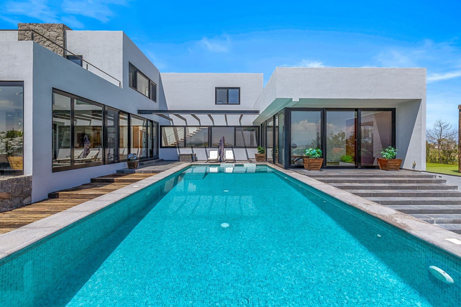 The Dream House — Zirándaro, San Miguel de Allende — photo 19 — modern luxury lap pool, architectural elegance