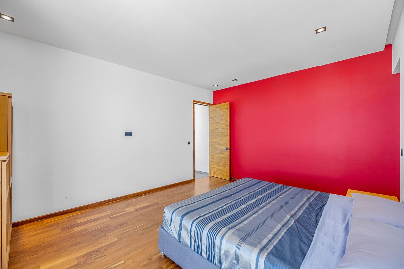 The Dream House — Zirándaro, San Miguel de Allende — photo 10 — vibrant accent wall, contemporary bedroom elegance