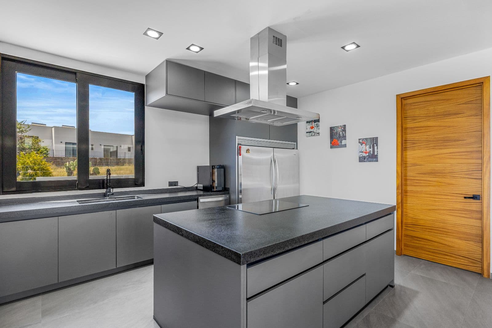 The Dream House — Zirándaro, San Miguel de Allende — photo 7 — contemporary chef's kitchen, light-filled elegance
