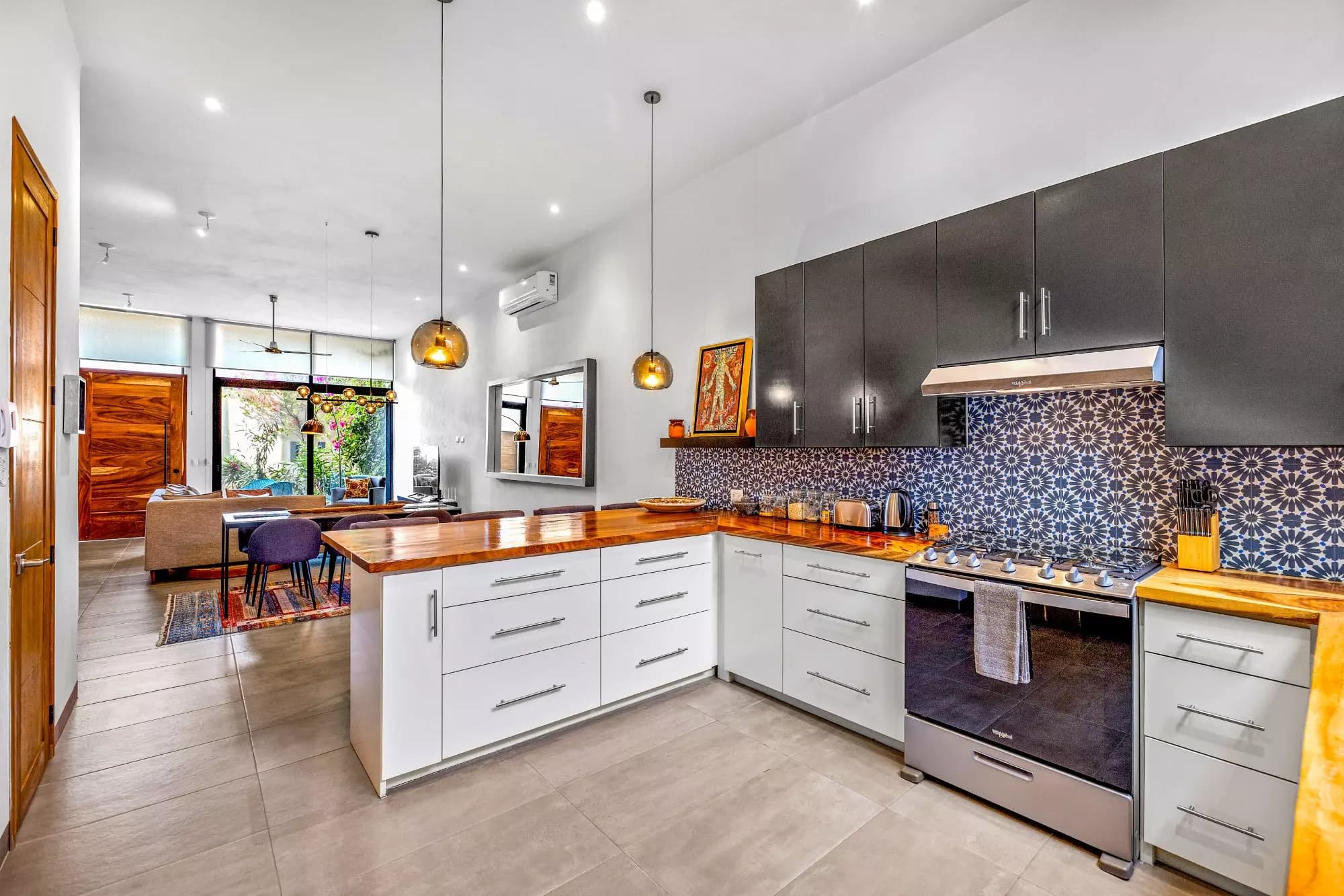 Casa Nochevieja — Guadalupe, San Miguel de Allende — photo 5 — contemporary chef's kitchen, artisanal elegance