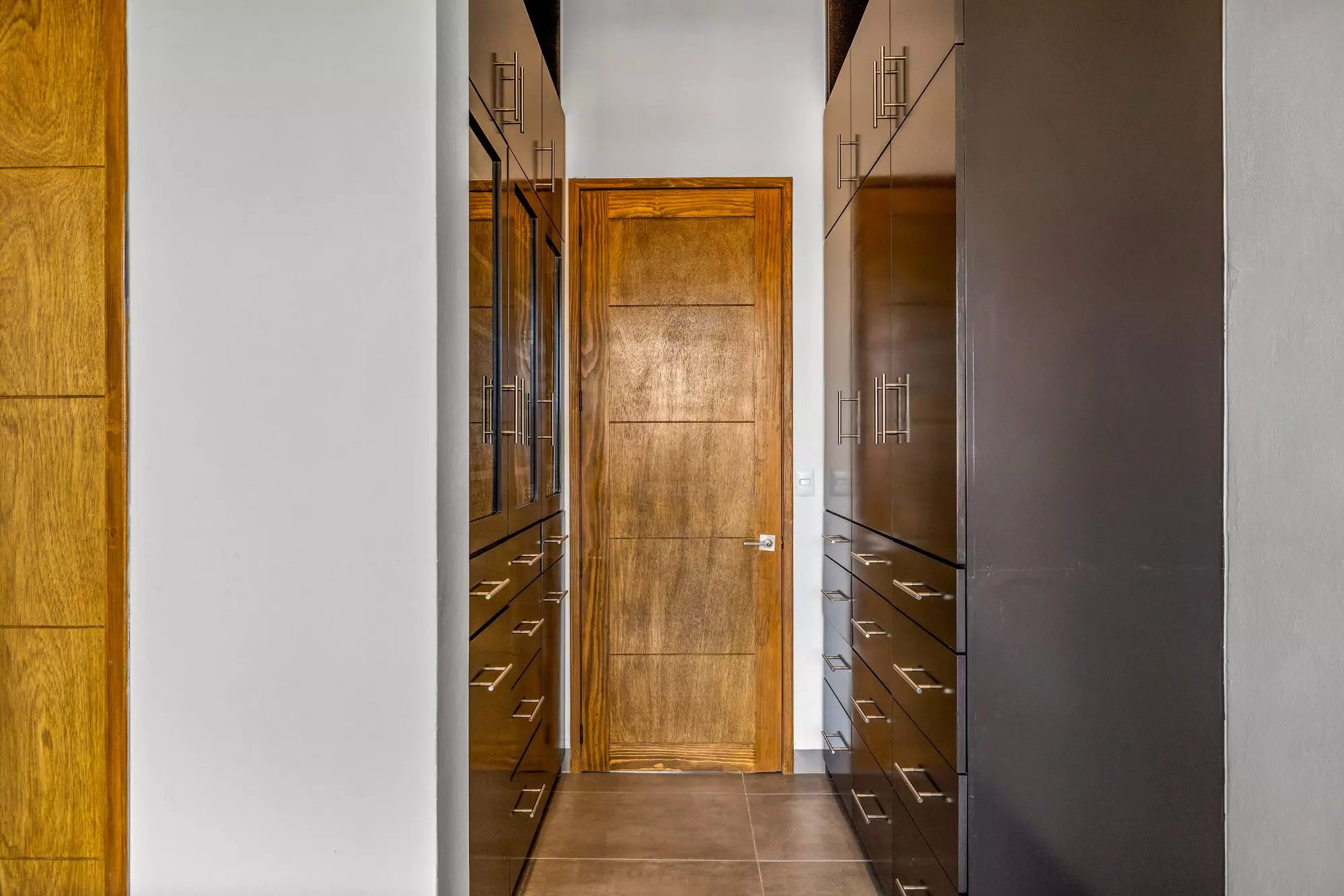 Casa Nochevieja — Guadalupe, San Miguel de Allende — photo 20 — elegant walk-in closet, rich wood finishes