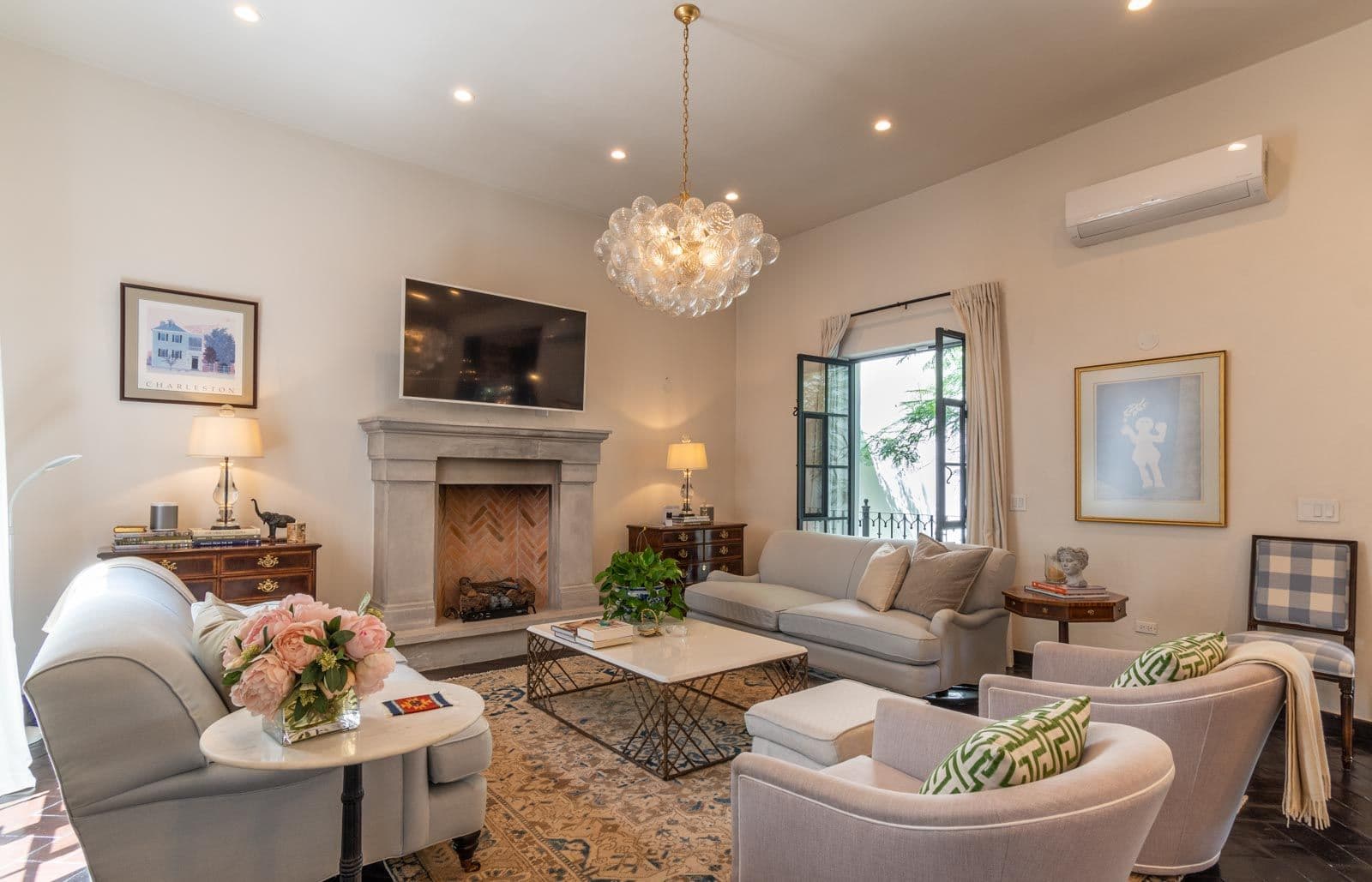 Casa Jacaranda — Guadiana, San Miguel de Allende — photo 12 — elegant living room, sophisticated fireplace focal point