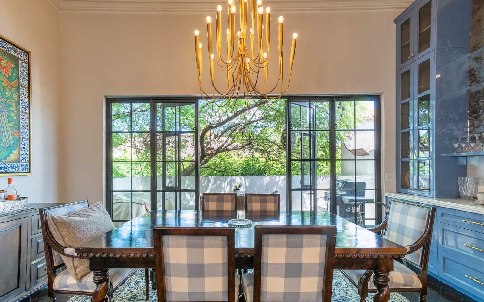 Casa Jacaranda — Guadiana, San Miguel de Allende — photo 17 — luminous dining, garden views, sophisticated elegance