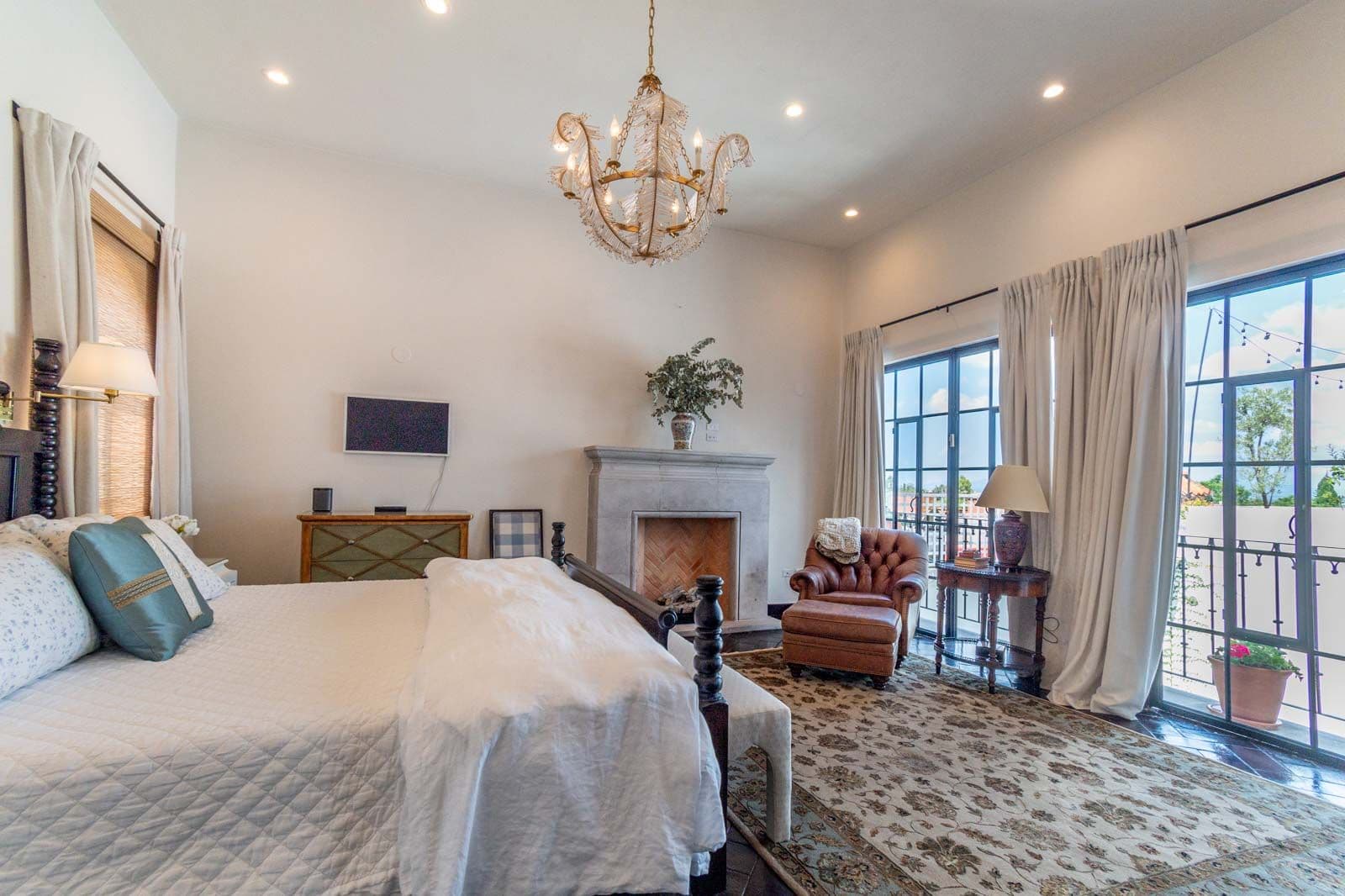 Casa Jacaranda — Guadiana, San Miguel de Allende — photo 25 — luminous master suite, fireplace, panoramic views