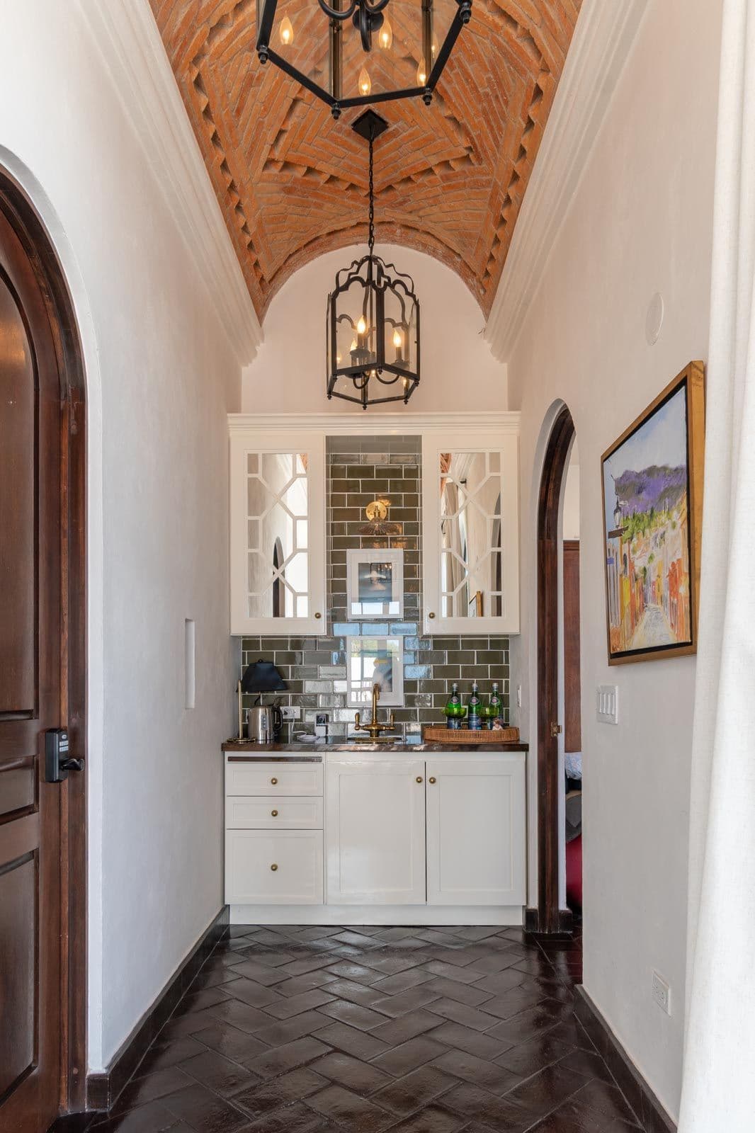 Casa Jacaranda — Guadiana, San Miguel de Allende — photo 23 — elegant wet bar, soaring wooden beams