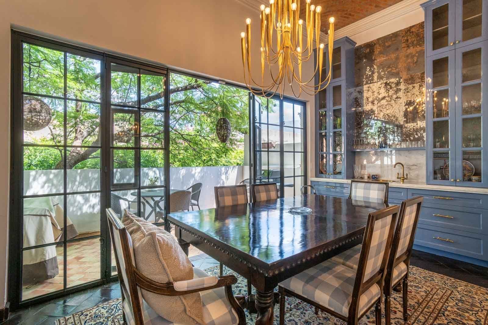 Casa Jacaranda — Guadiana, San Miguel de Allende — photo 18 — elegant dining with garden views