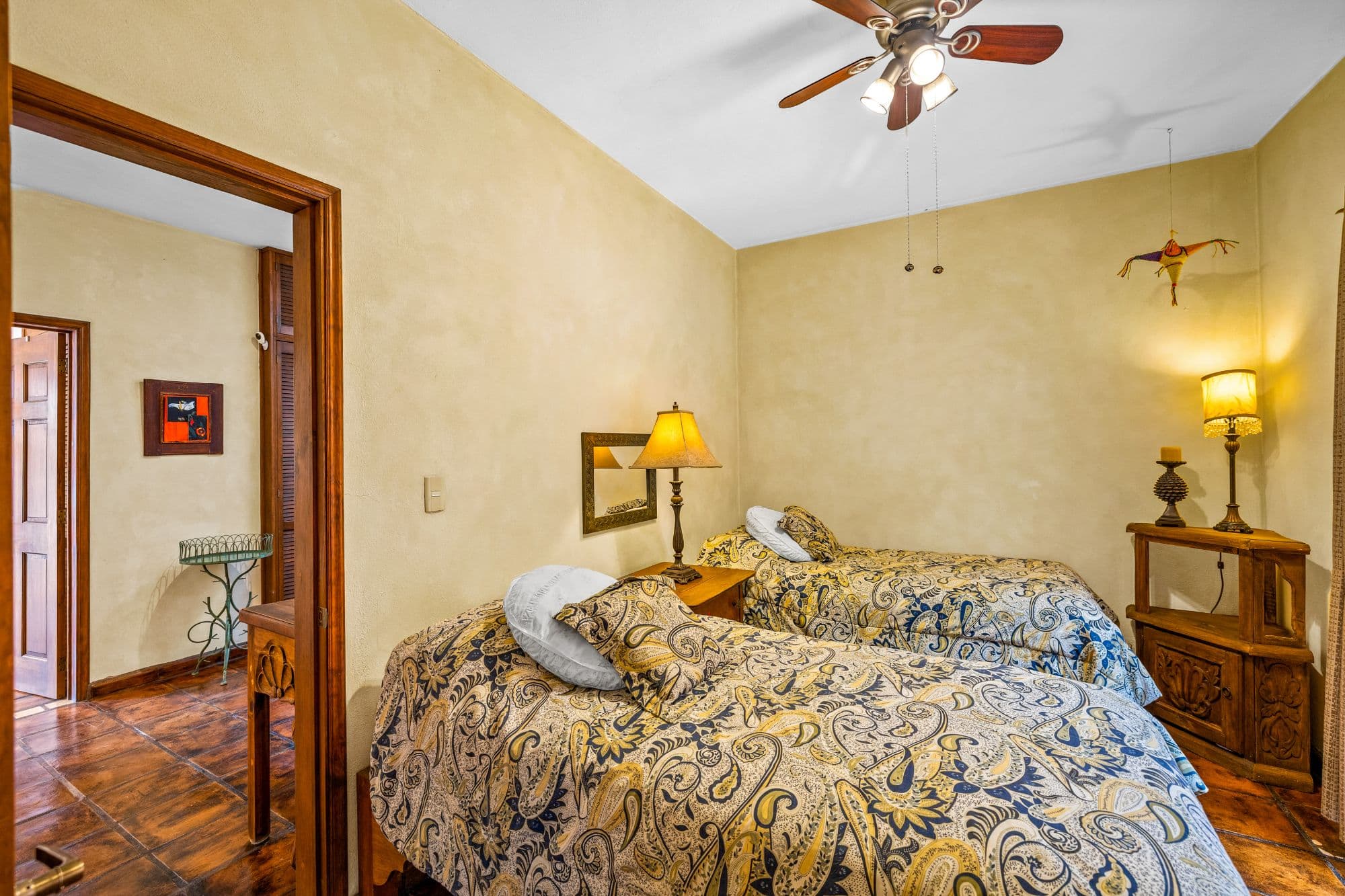 Casa de las Nubes — San Antonio, San Miguel de Allende — photo 12 — sunlit bedroom with traditional mexican charm