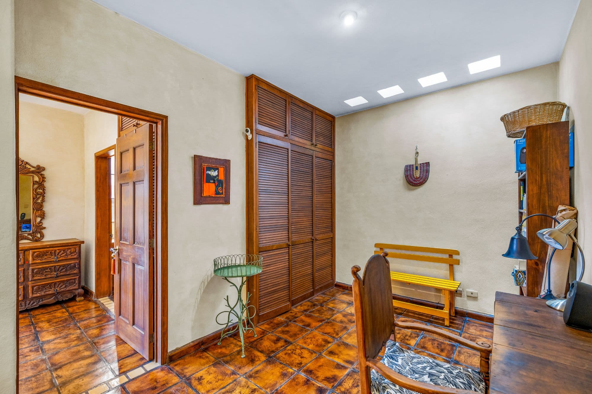 Casa de las Nubes — San Antonio, San Miguel de Allende — photo 8 — charming entryway with rustic wooden details