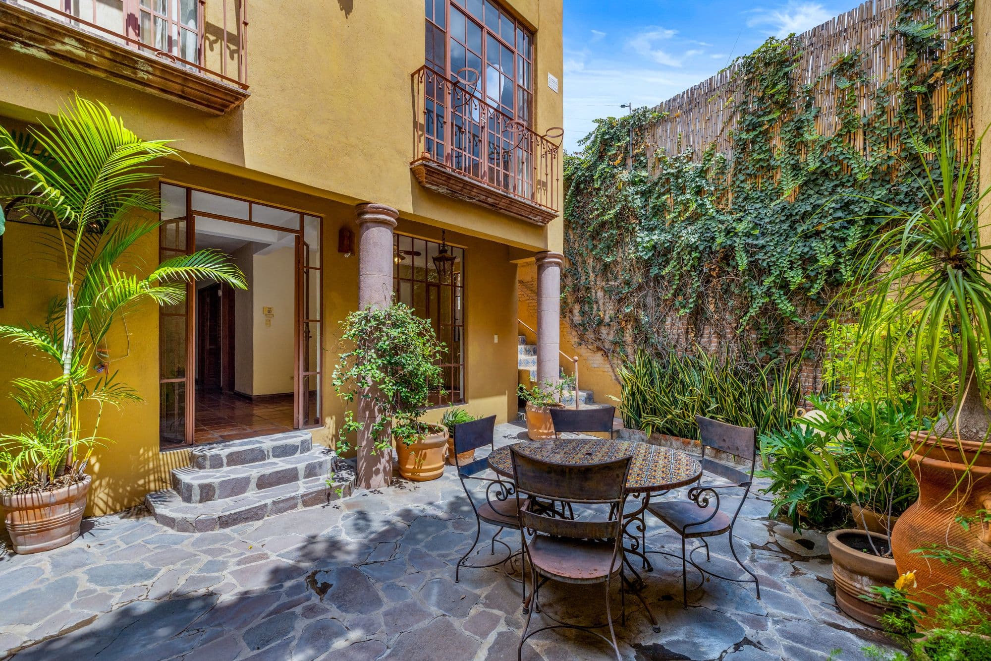 Casa de las Nubes — San Antonio, San Miguel de Allende — photo 17 — enchanting courtyard, lush tropical sanctuary