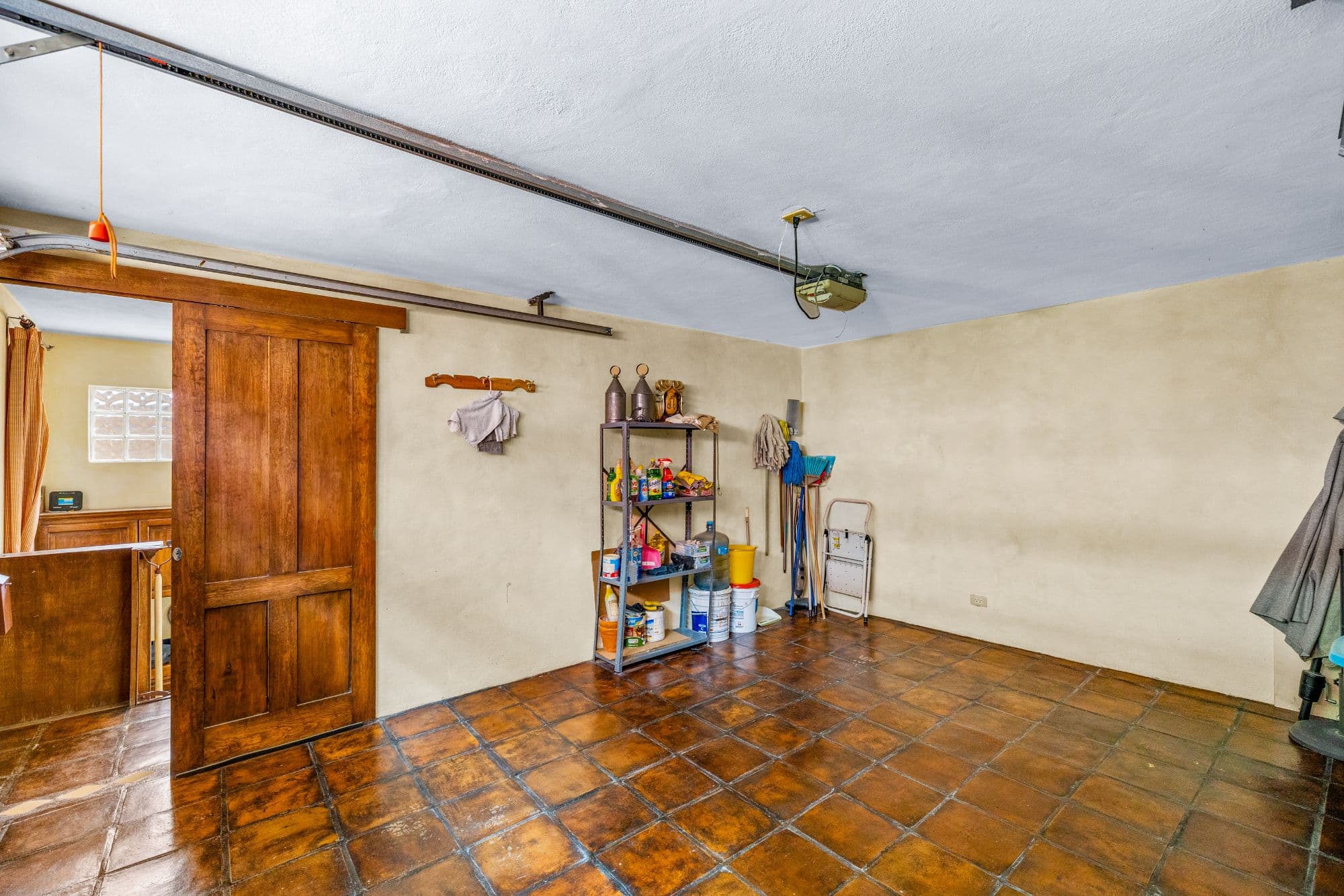 Casa de las Nubes — San Antonio, San Miguel de Allende — photo 23 — spacious utility room, authentic terracotta flooring