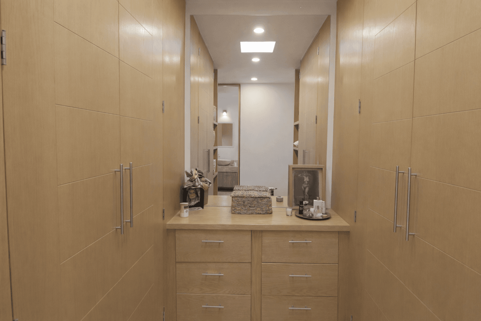 Casa Andrea — Valle del Maíz, San Miguel de Allende — photo 17 — spa-like master closet, sophisticated storage elegance