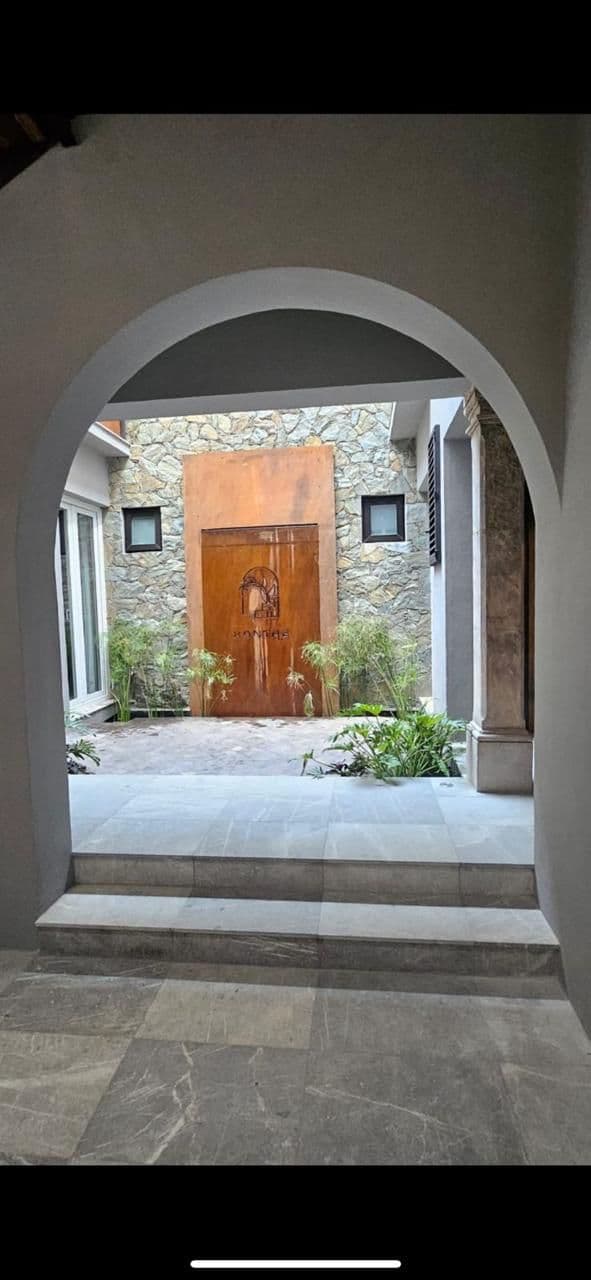 RECREO 15 — Centro, San Miguel de Allende — photo 3 — elegant arched entry, rustic charm awaits