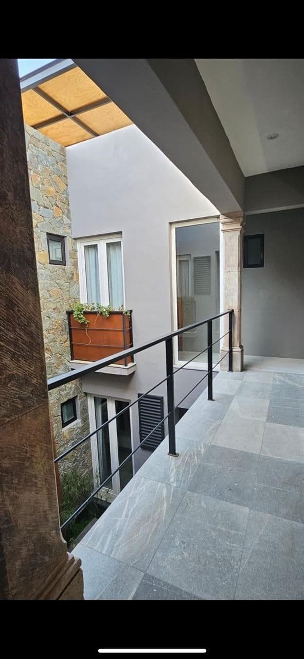 RECREO 15 — Centro, San Miguel de Allende — photo 17 — contemporary courtyard with architectural elegance