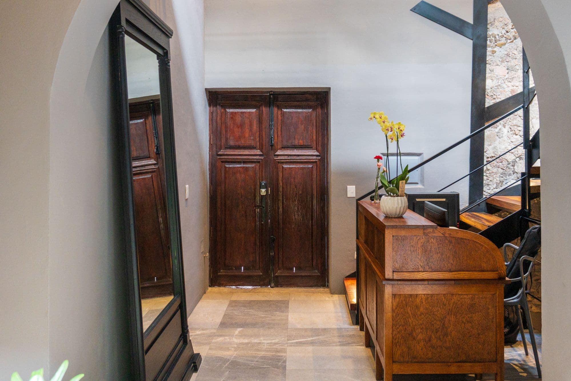 CASA XANTHE — Centro, San Miguel de Allende — photo 29 — elegant entry with colonial architecture and light