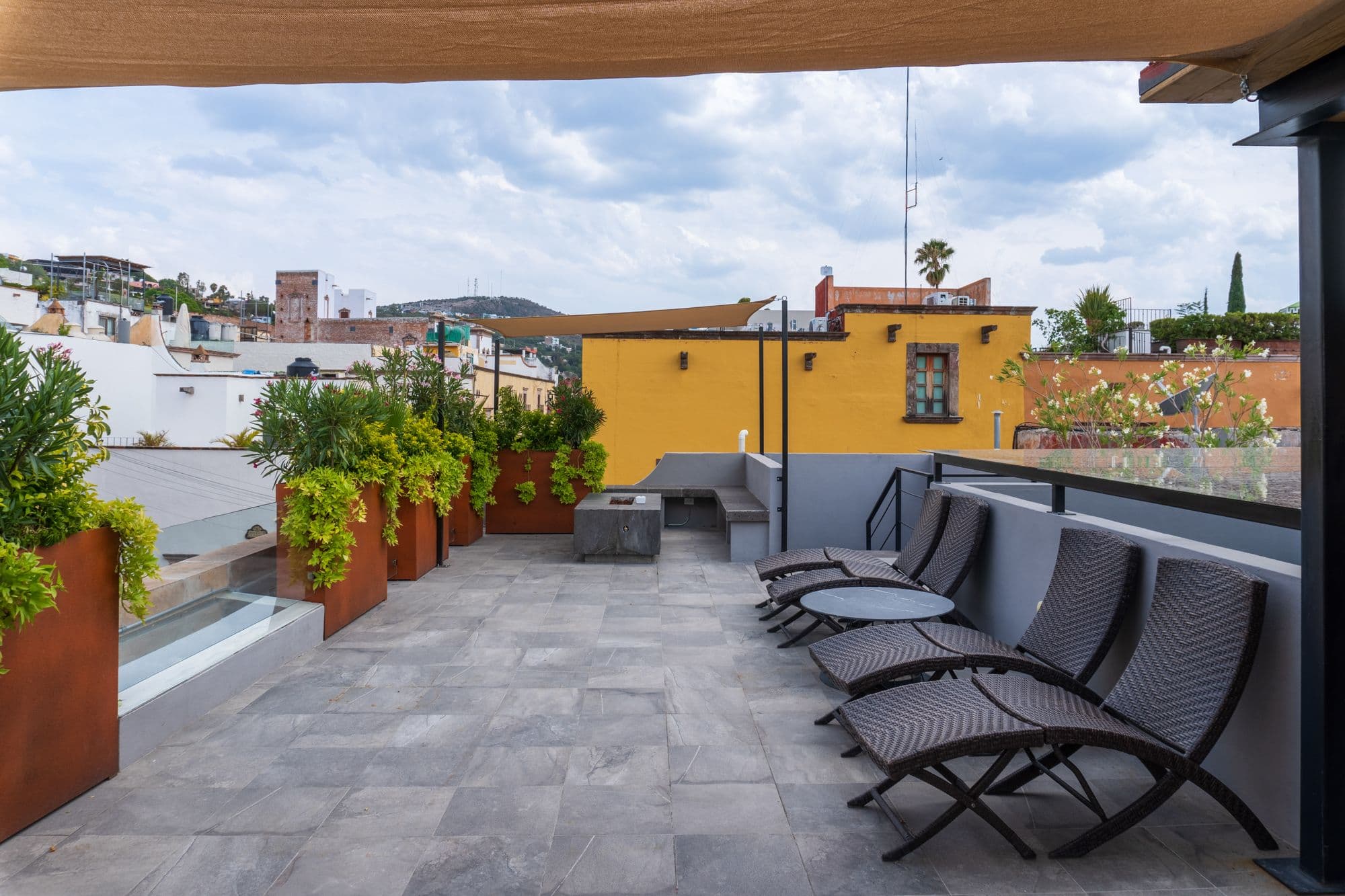 CASA XANTHE — Centro, San Miguel de Allende — photo 24 — sophisticated rooftop terrace, vibrant colonial views