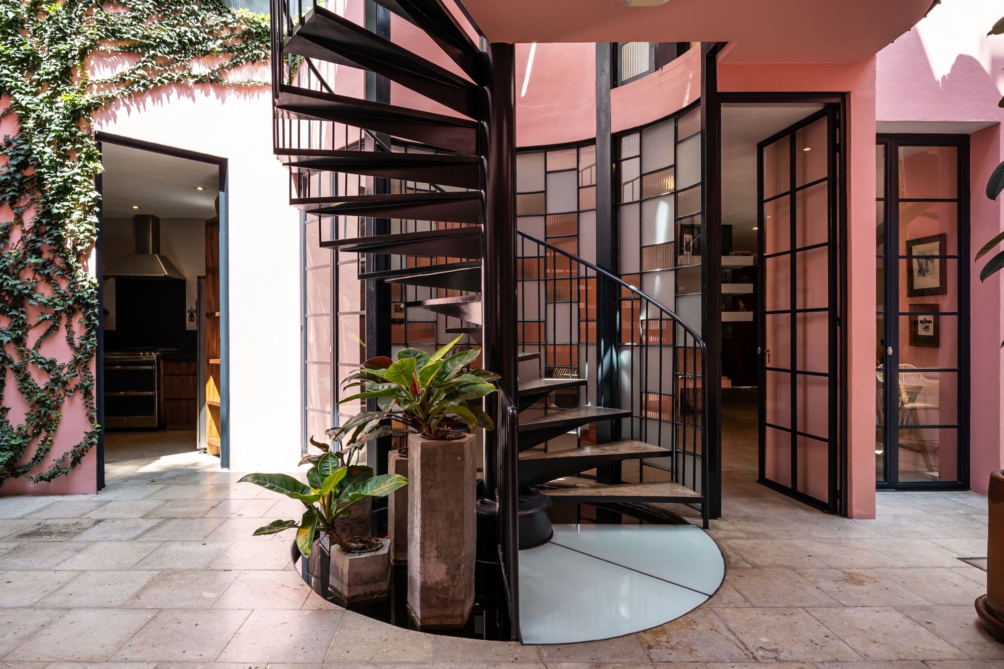 The Brooklane — Centro, San Miguel de Allende — photo 3 — sophisticated spiral staircase courtyard oasis