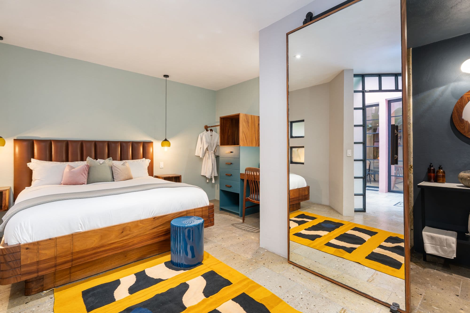 The Brooklane — Centro, San Miguel de Allende — photo 28 — sophisticated master suite, warm wood elegance