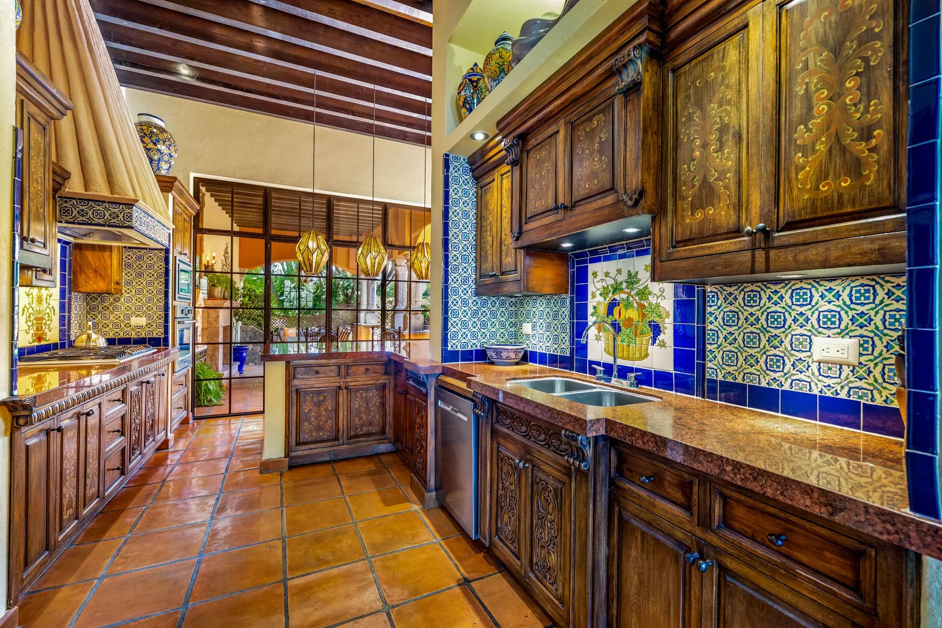 Casa Flora — Guadiana, San Miguel de Allende — photo 10 — stunning artisanal kitchen, colonial elegance