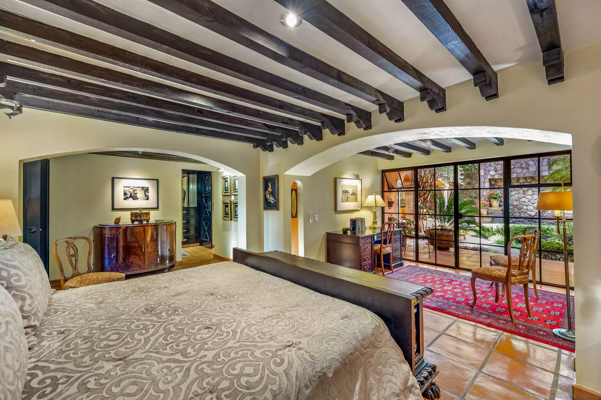 Casa Flora — Guadiana, San Miguel de Allende — photo 21 — elegant master suite, soaring beamed ceilings