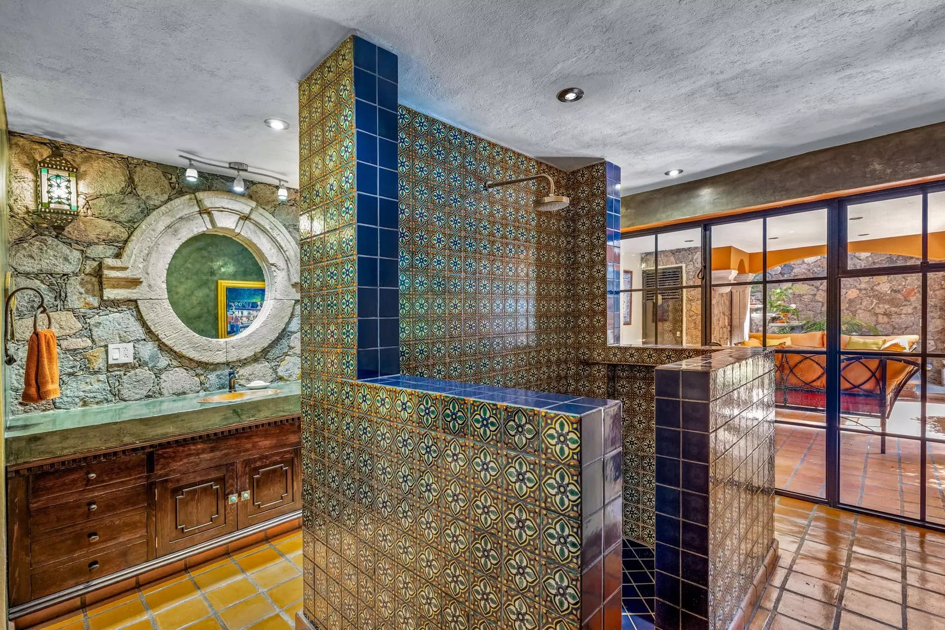 Casa Flora — Guadiana, San Miguel de Allende — photo 22 — artisan-tiled spa bathroom, stunning mountain views