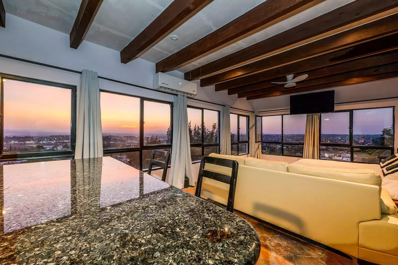 Casa Bella-Vista — Caracol, San Miguel de Allende — photo 6 — sunset panoramas, soaring timber beams