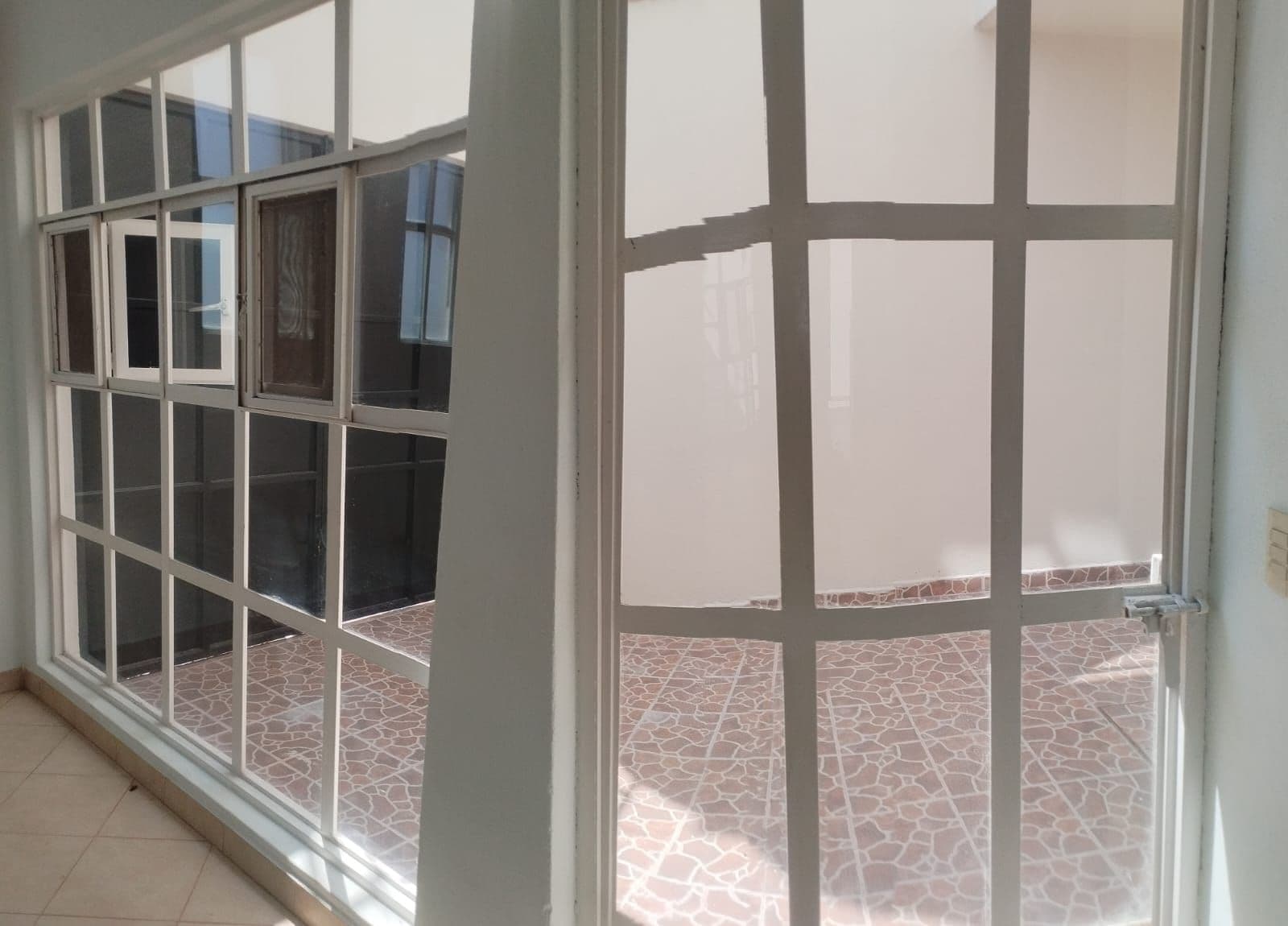 Casa Gogorrón Brisas — Las Brisas, San Miguel de Allende — photo 5 — bright terrace access, classic grid windows