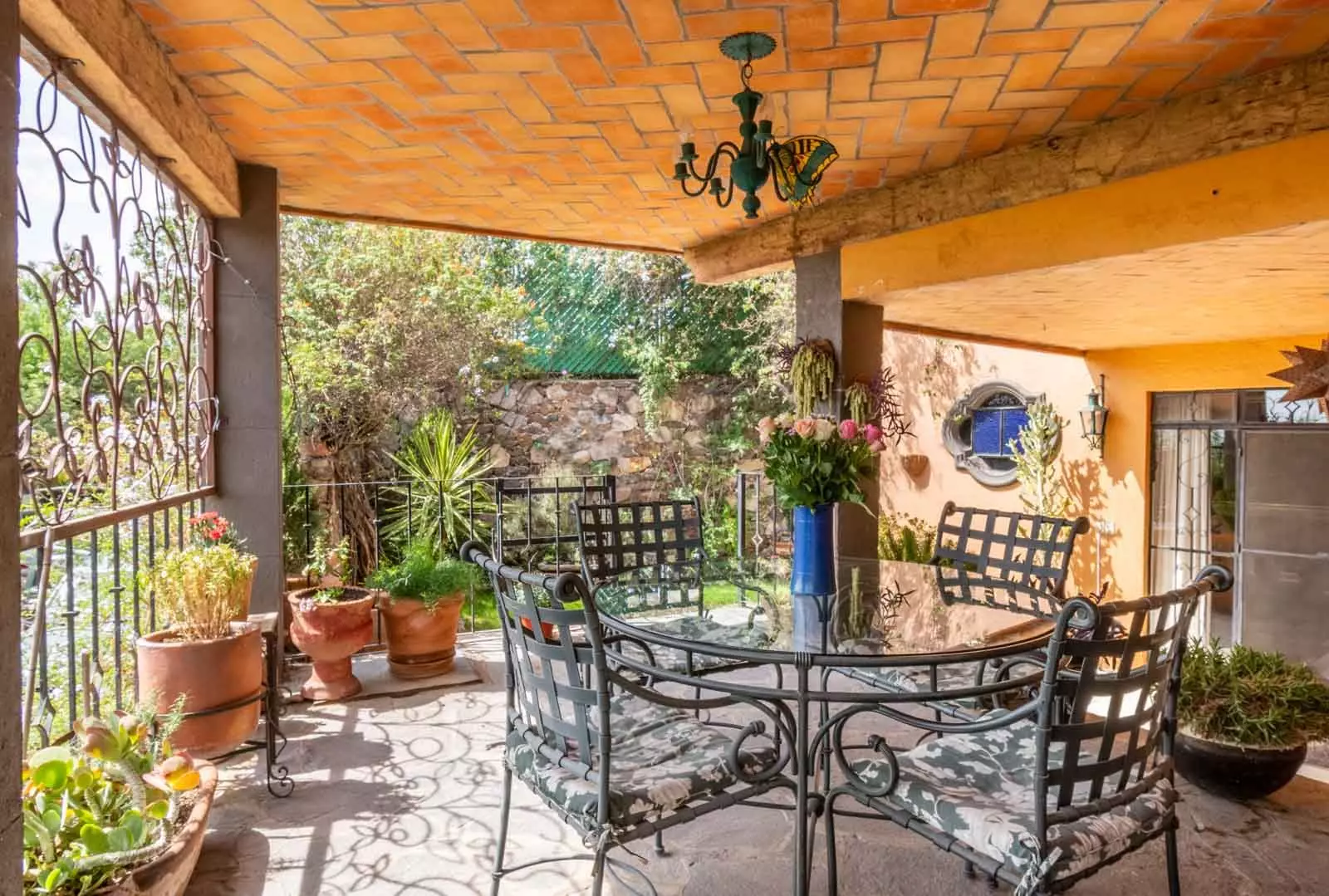 Casa Mirador del Sol — Ojo de Agua, San Miguel de Allende — photo 13 — charming terracotta patio, vibrant garden views