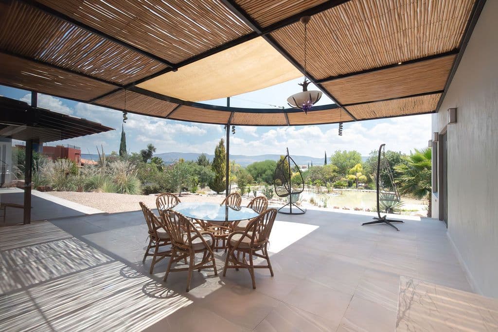 Casa Arcoiris en Rancho Los Labradores — Los Labradores, San Miguel de Allende — photo 7 — sophisticated terrace with panoramic mountain views