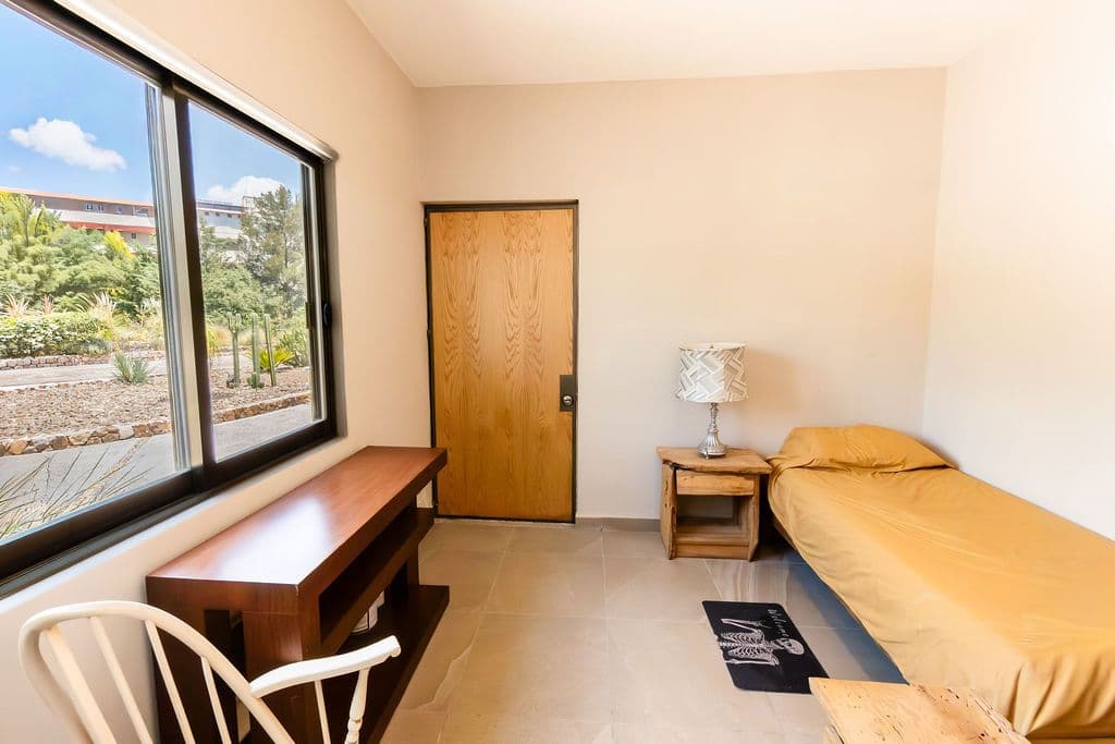 Casa Arcoiris en Rancho Los Labradores — Los Labradores, San Miguel de Allende — photo 24 — serene guest room, radiant natural light