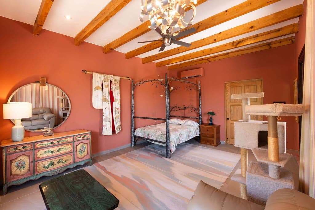 Casa Arcoiris en Rancho Los Labradores — Los Labradores, San Miguel de Allende — photo 17 — rustic-chic master suite with soaring beams