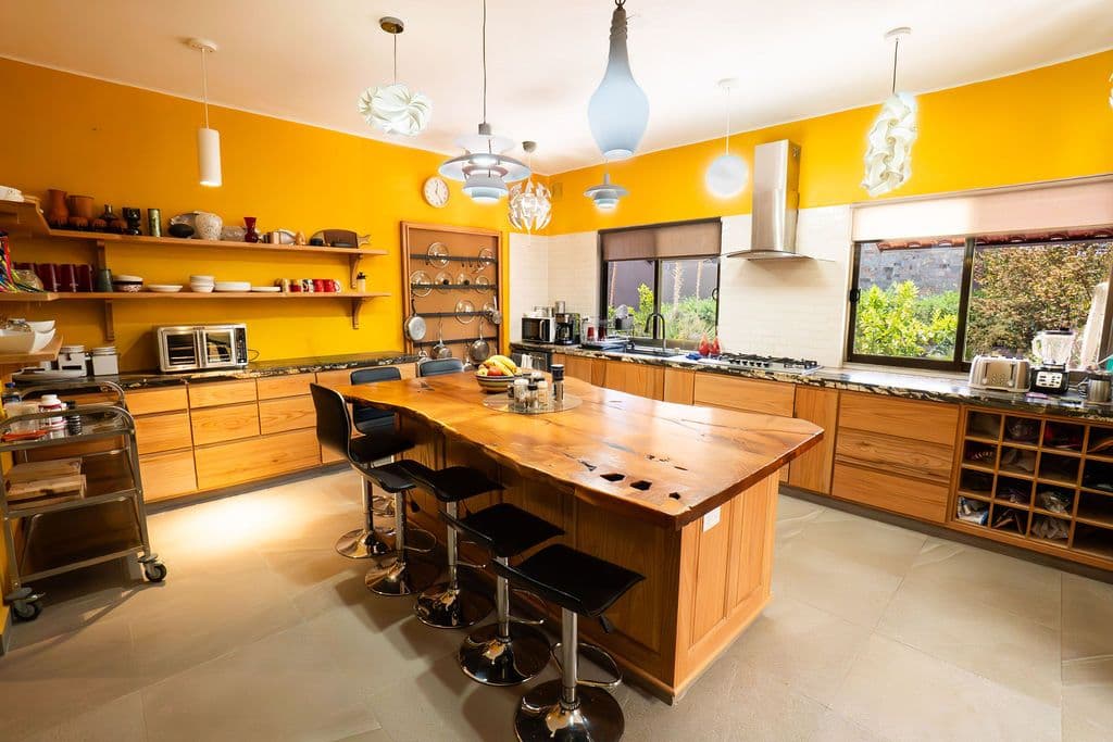 Casa Arcoiris en Rancho Los Labradores — Los Labradores, San Miguel de Allende — photo 8 — vibrant chef's kitchen with abundant natural light