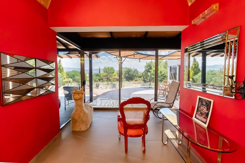 Casa Arcoiris en Rancho Los Labradores — Los Labradores, San Miguel de Allende — photo 4 — vibrant entertaining space, panoramic valley views