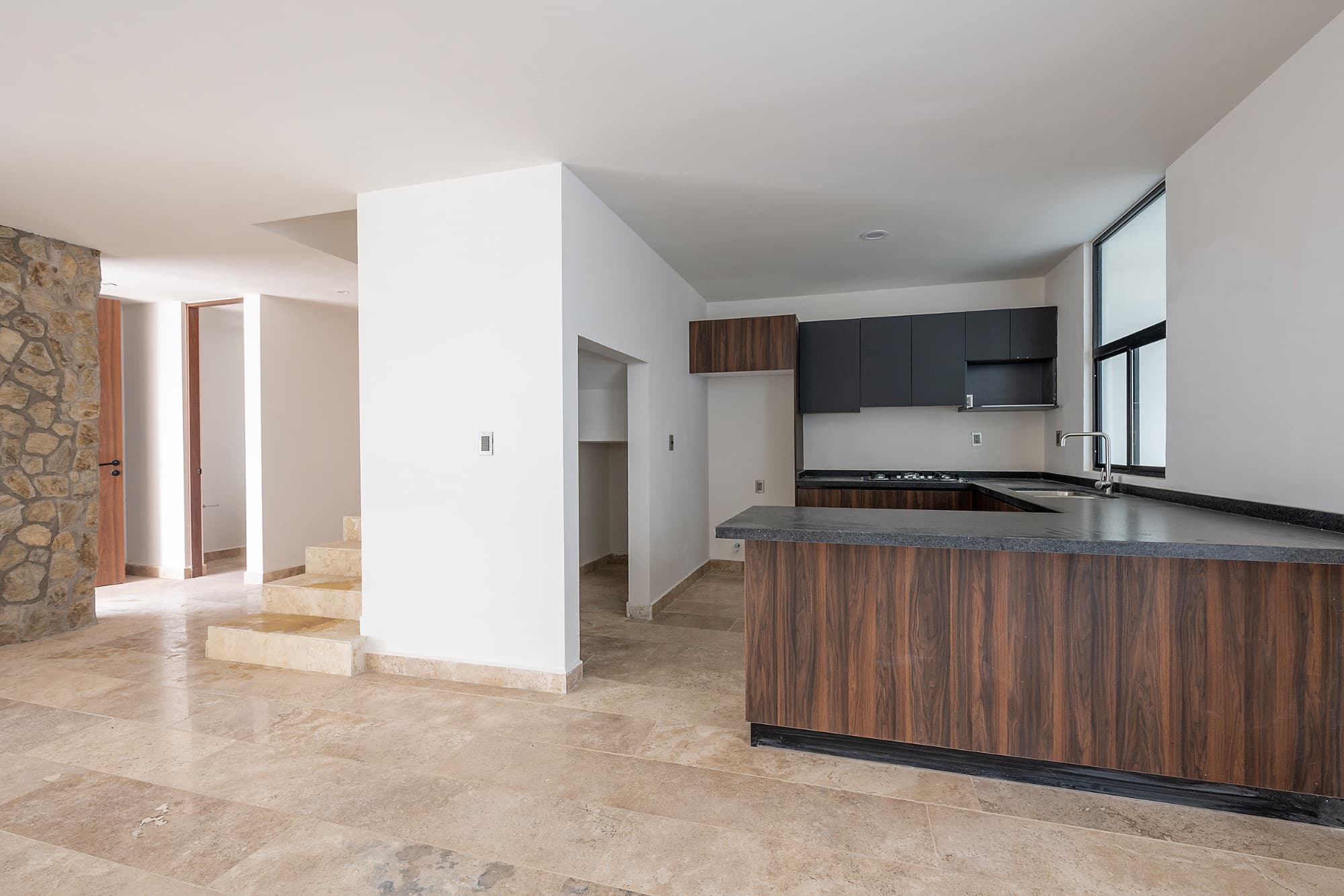 Rinconada Del Pedregal / Modelo A — La Lejona, San Miguel de Allende — photo 3 — contemporary kitchen with warm natural light