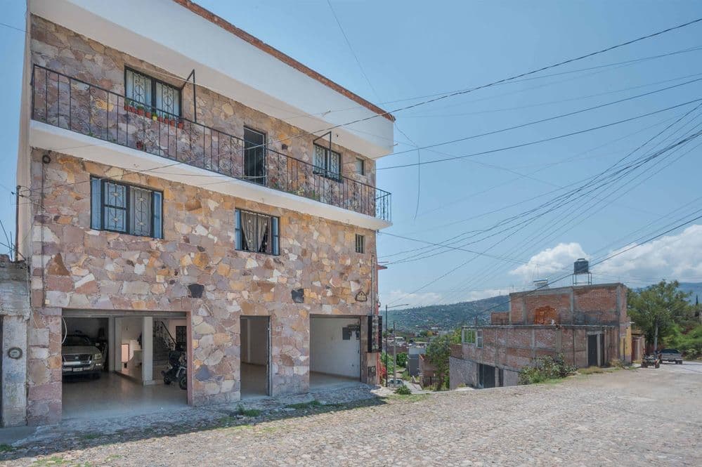 Nine-unit apartment building with varied layouts—ideal for investment.