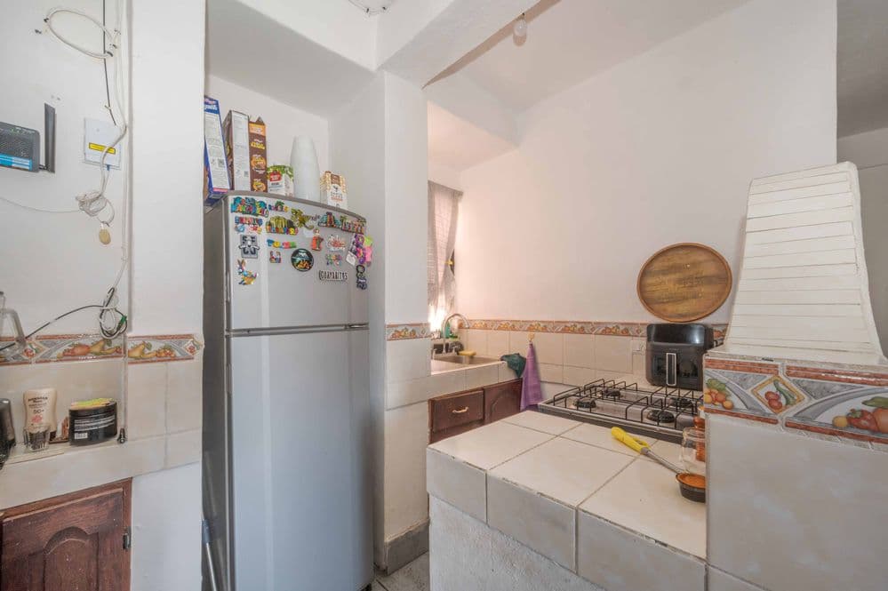 Nine-unit apartment building with varied layouts—ideal for investment. — Lindavista, San Miguel de Allende — photo 3